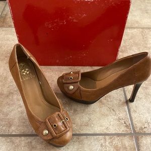 Size 8 Tan heel with a buckle